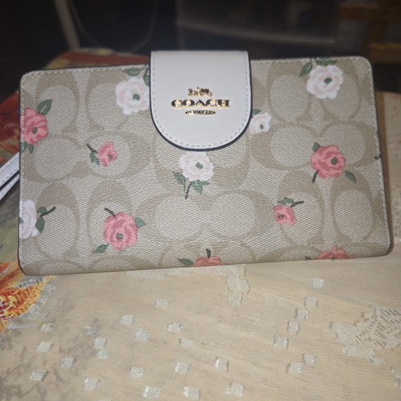 Coach Handbags - Coach Floral Beige Wallet